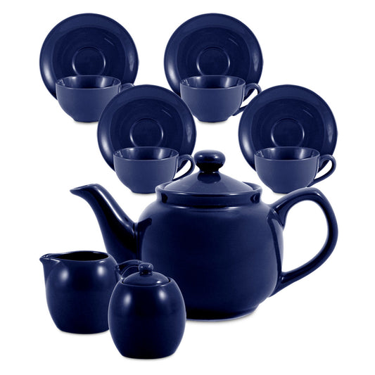 Navy blue ceramic tea set including teapot, cups, and plates on a white background