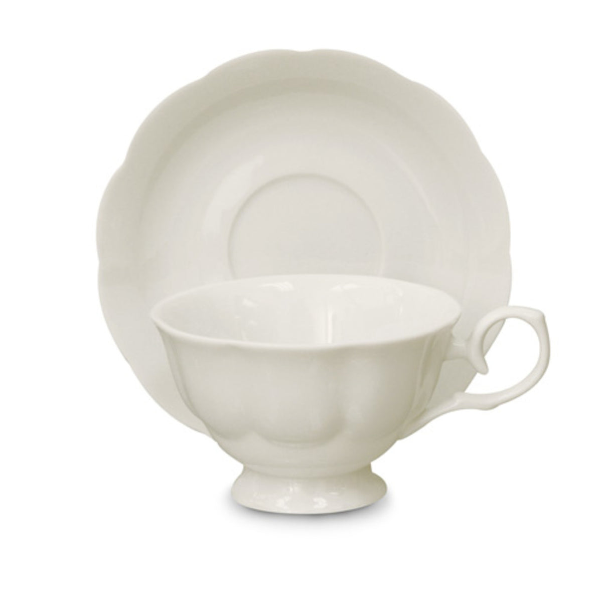 White porcelain teacup and saucer