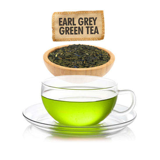 Glass cup of green tea with a bowl of tea leaves and a label above on a white background