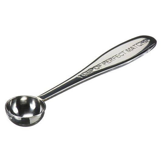 Stainless steel measuring spoon with 'Your Perfect Match' engraving on a white background