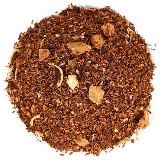 Pile of loose-leaf rooibos tea with mixed with dried fruit pieces