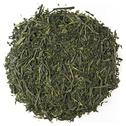 Green tea leaves on a white background