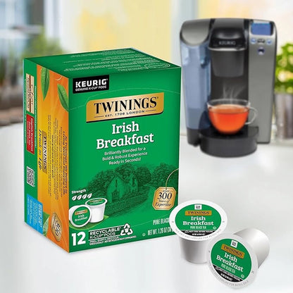 Twinings Irish Breakfast Keurig K-Cup pods with a Keurig machine in the background.