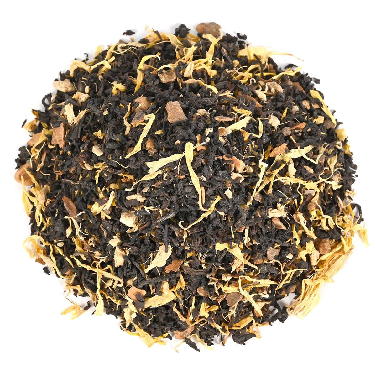 Loose-leaf black tea with dried spices and fruit pieces mixed with yellow petals.