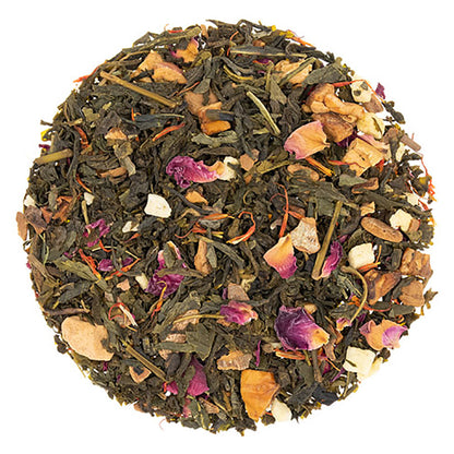 Tea blend with various herbs and flowers on a white background