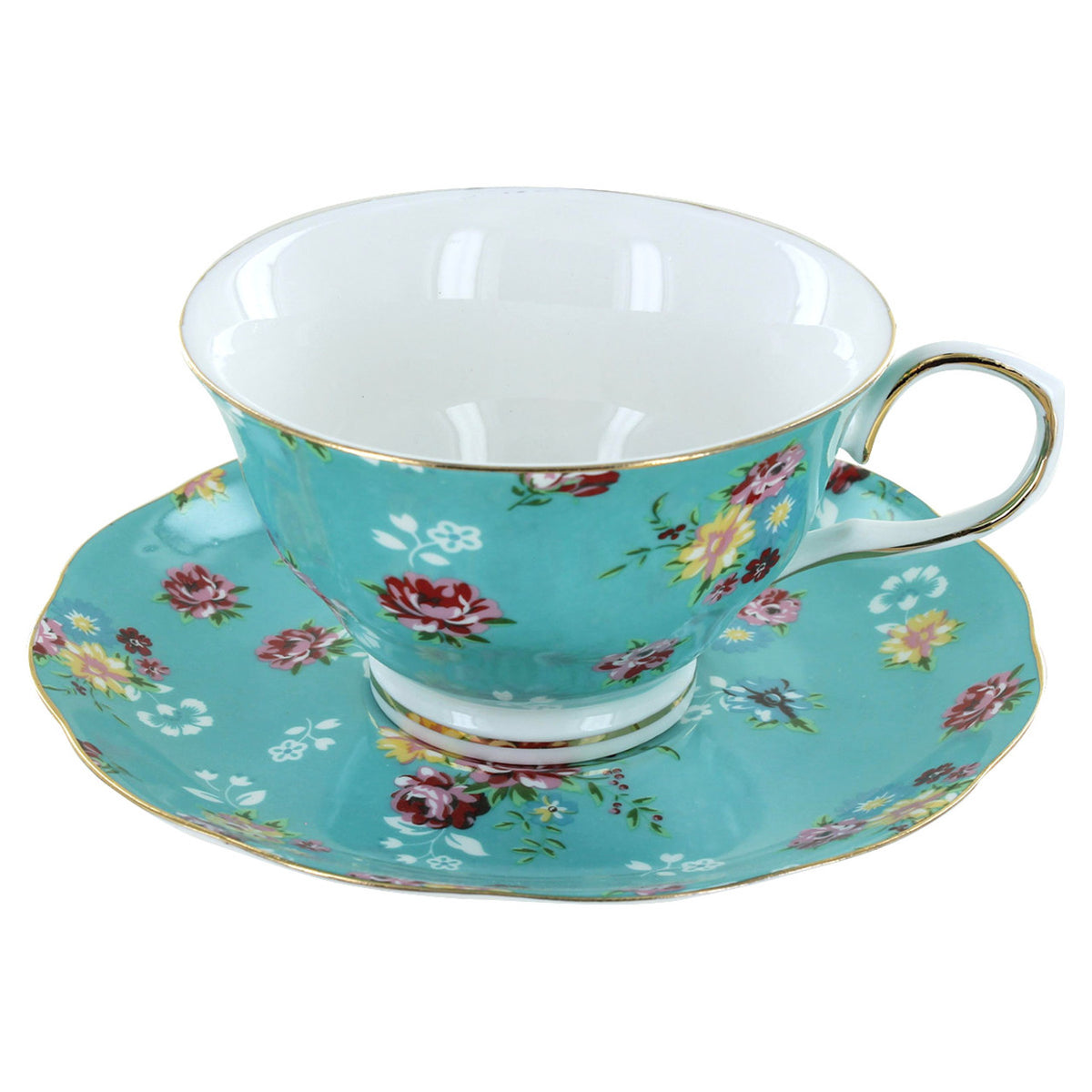 Porcelain teacup and saucer with floral design on a white background