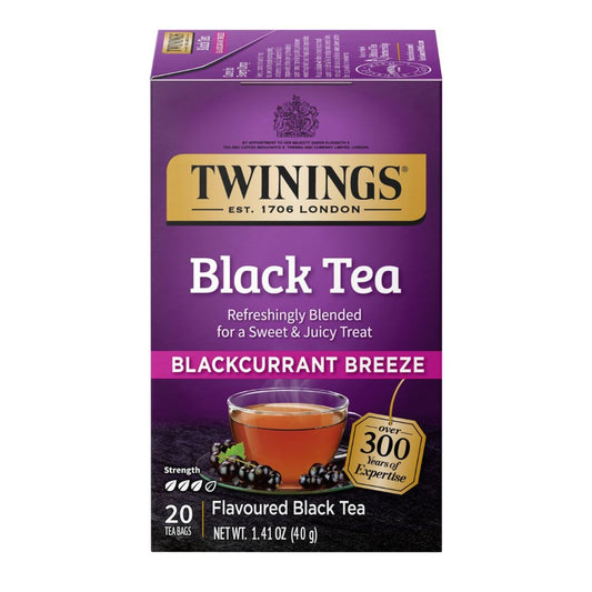 Purple box of Twinings Blackcurrant Breeze black tea on a white background