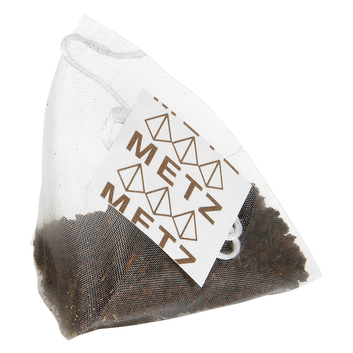 Pyramid style teabag featuring visible dried tea leaves and a Metz label.
