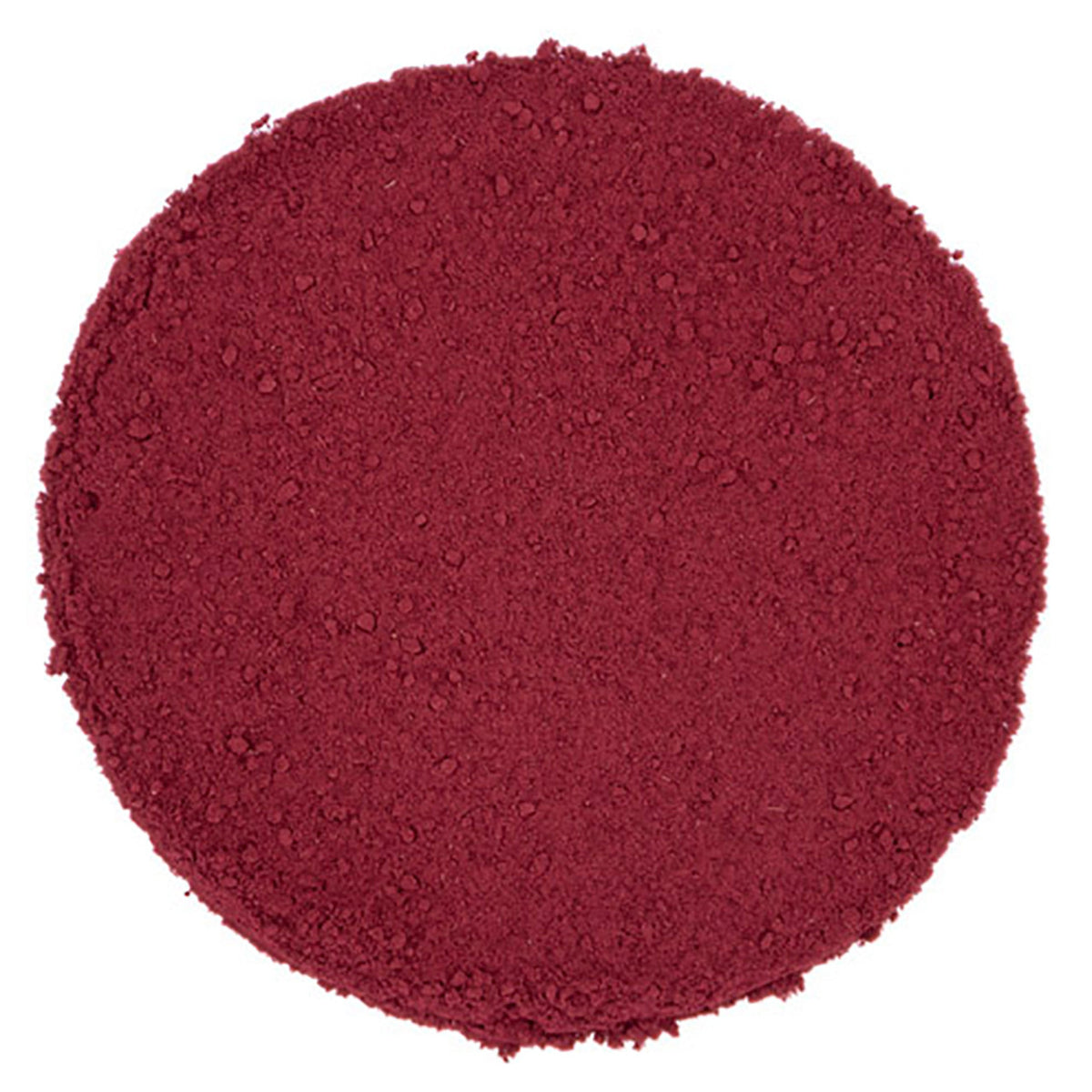 Round pile of coarse ground red colored tea leaves on a white background