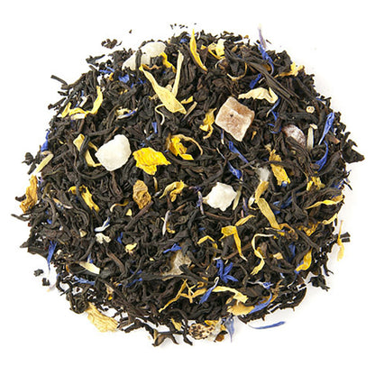 A close-up of Blue Lady Flavored Black Tea loose leaf, showing the tea leaves and pieces of fruit and petals blended together.