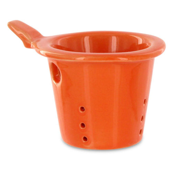 Orange ceramic teapot infuser on a white background