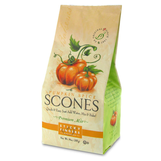 Package of Pumpkin Spice Scones mix with pumpkins on a beige background