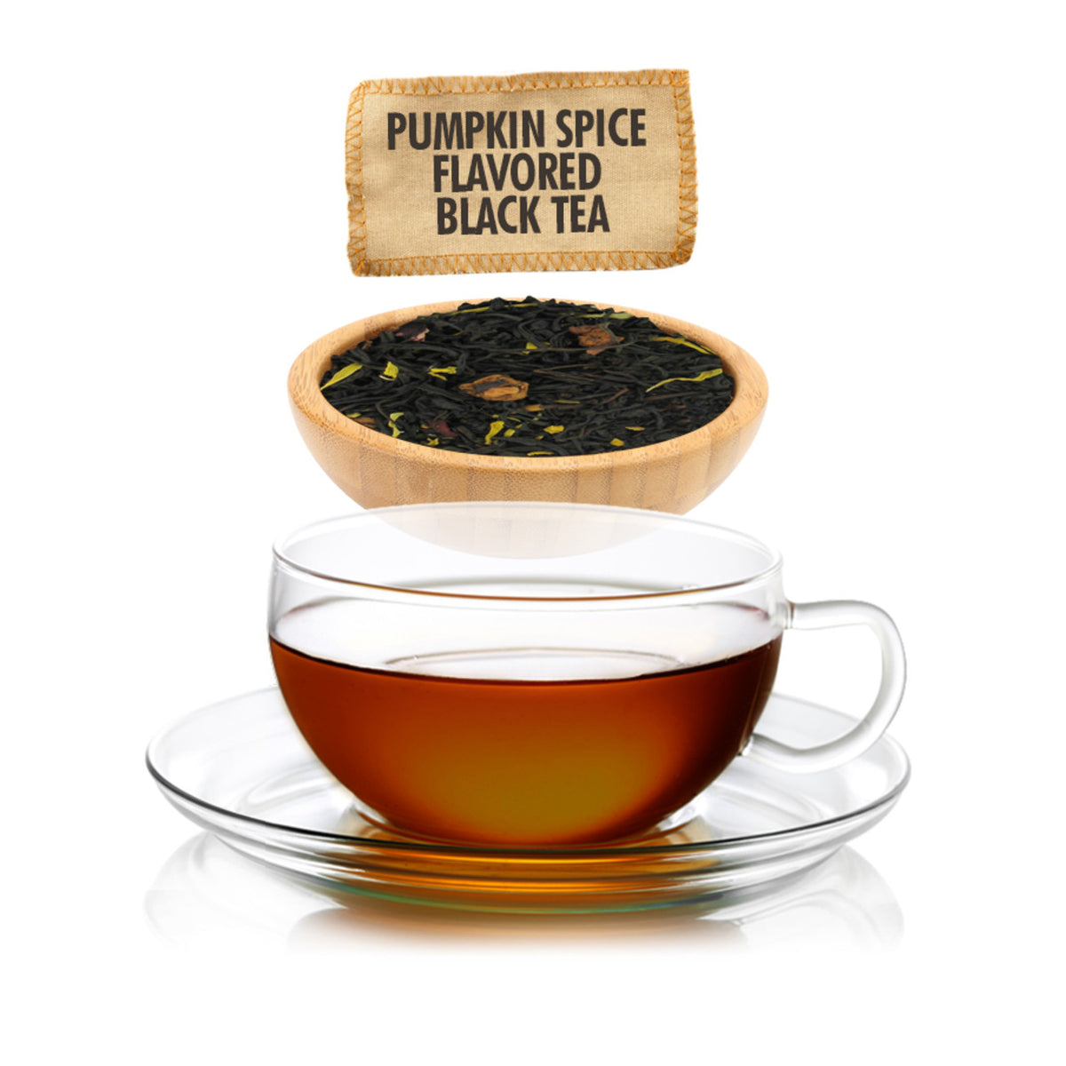 Pumpkin spice flavored black tea with a glass cup of tea and a bowl of tea leaves.