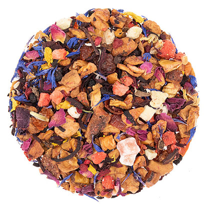 Colorful arrangement of assorted dried tea leaves, flowers, and fruit pieces on a white background