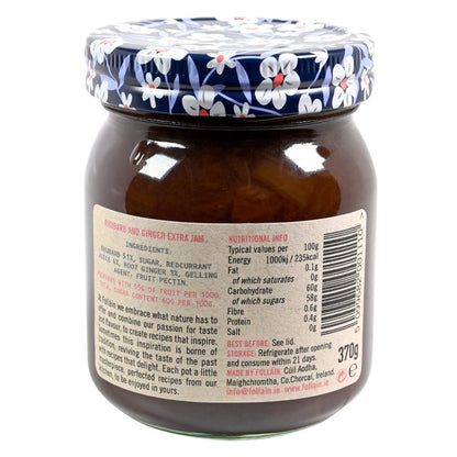 Jar of Folláin Rhubarb and Ginger jam with a floral lid on a white background