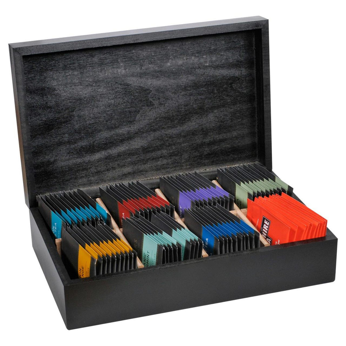 Black wooden tea chest with individually wrapped Taylors of Harrogate teabags on a white background
