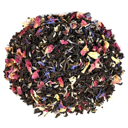 Heap of loose-leaf black tea with mixed with Green Tea, Jasmine Petals, Lavender Petals, and rose petals.