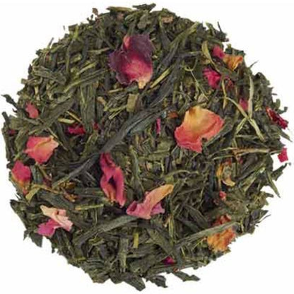 Green tea ball with pink and orange petals on a white background