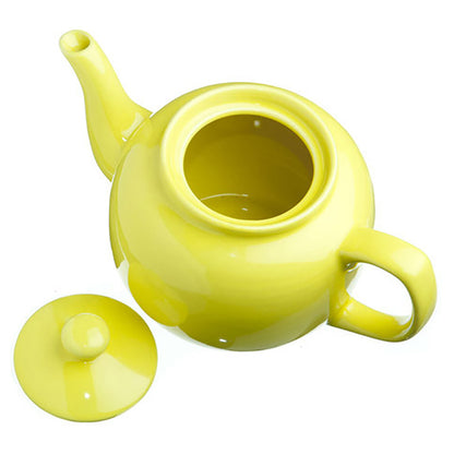 Yellow teapot with a matching lid on a white background