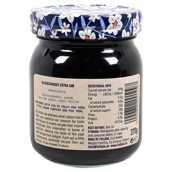 Back side of a jar of Follain Blackcurrant extra Jam with ingredients. 