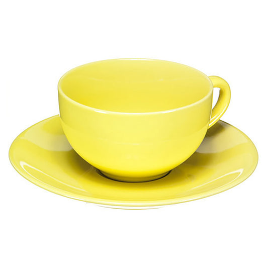 Yellow cup and saucer set on a white background