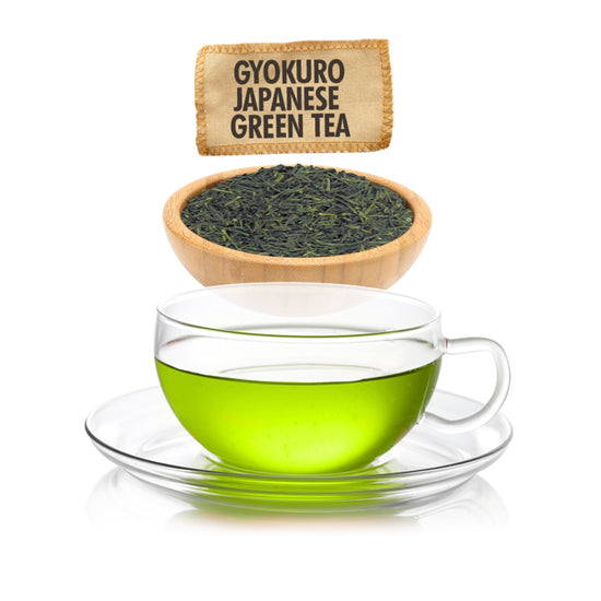 Glass cup of green tea with a bowl of green tea leaves and a label above on a white background.