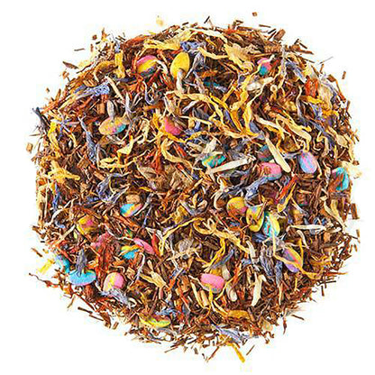 Colorful dried tea leaves and flower petals on a white background