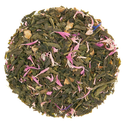 Green tea leaves with pink petals on a white background