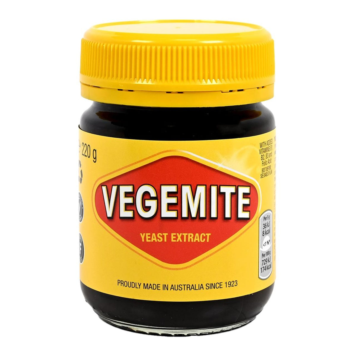 Jar of Vegemite yeast extract with a yellow lid on a white background