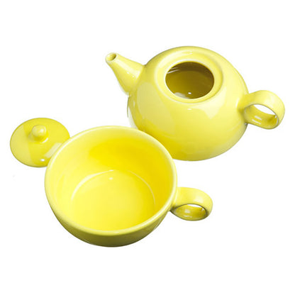 Yellow ceramic teapot and cup set on a white background