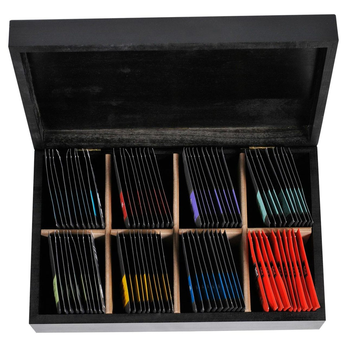 Black wood tea chest box opened with colorful individually wrapped teabags inside