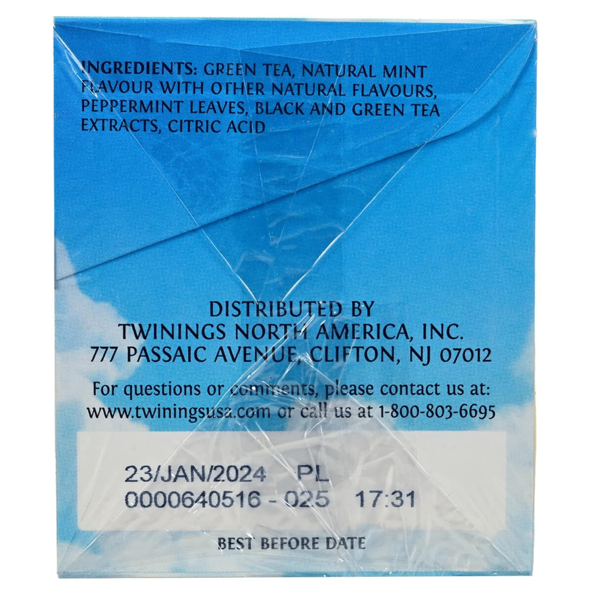 Blue tea package with text on ingredients and distribution details.