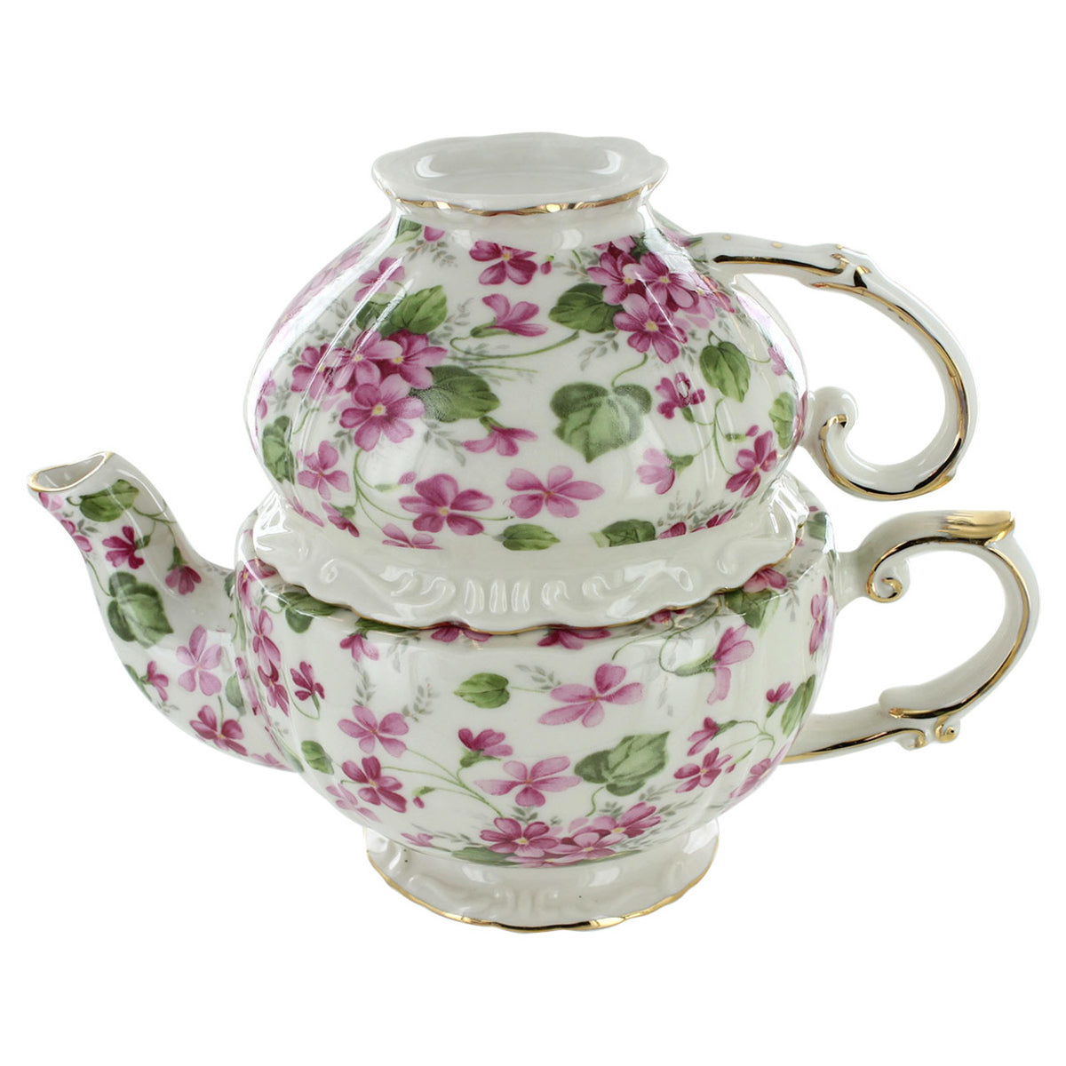 Porcelain floral-patterned teapot and matching cup on a white background