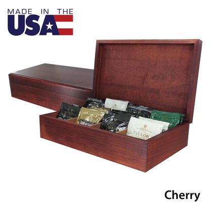 Wooden tea box opened displaying colorful individually wrapped Taylors teabags with a second chest closed and the text on the white background showing Made in the USA and the word Cherry