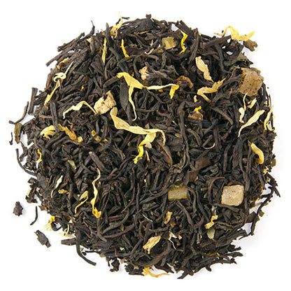 Tea leaves with yellow flowers on a white background
