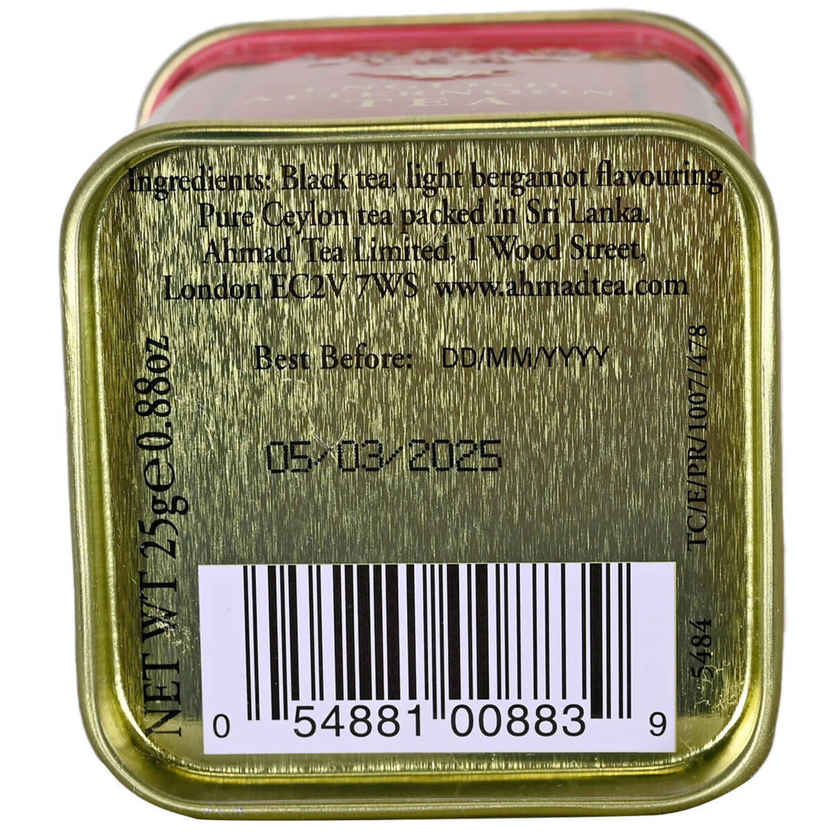 Back of a tea tin with ingredients, branding, and best before date information.