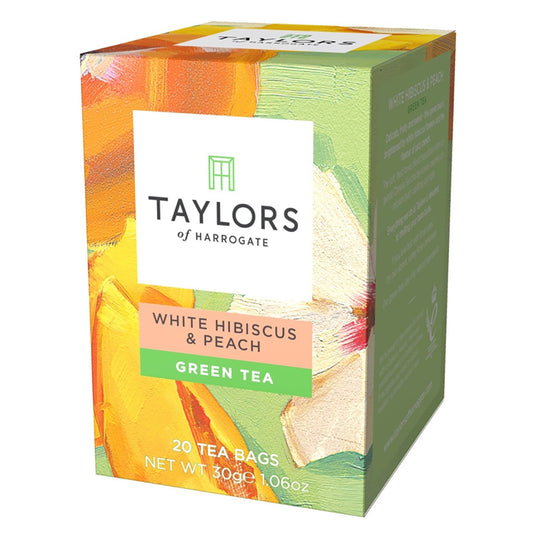 Box of Taylors of Harrogate White Hibiscus & Peach Green Tea on a white background