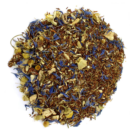 A mixture of dried tea leaves, apple pieces, and other herbal ingredients, loose leaf tea blend.