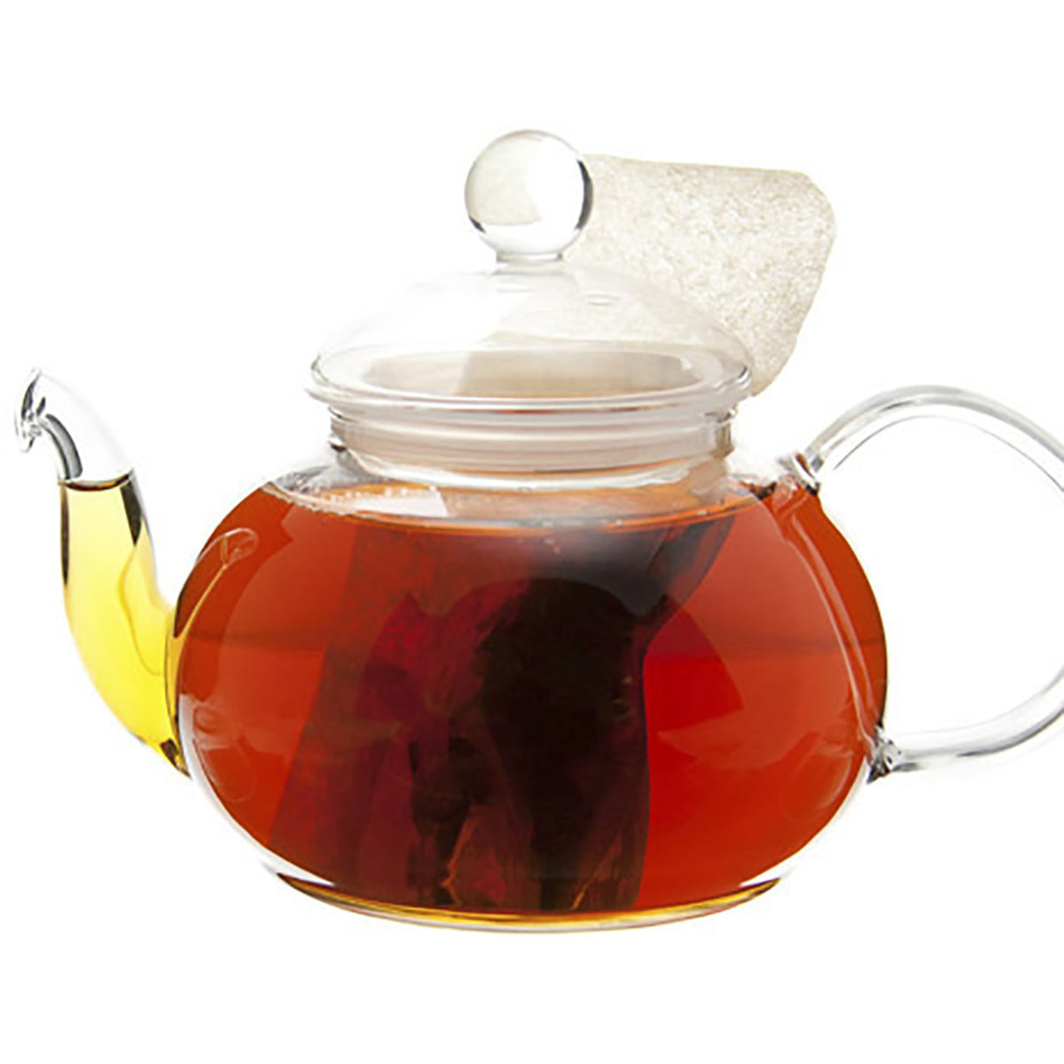 Clear glass teapot with a lid filled with red tea on a white background