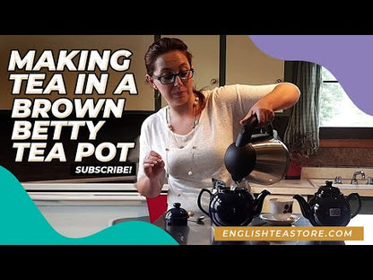 Making tea in a brown betty tea pot video
