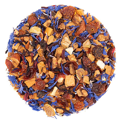Tea ball with dried fruits and spices on a white background