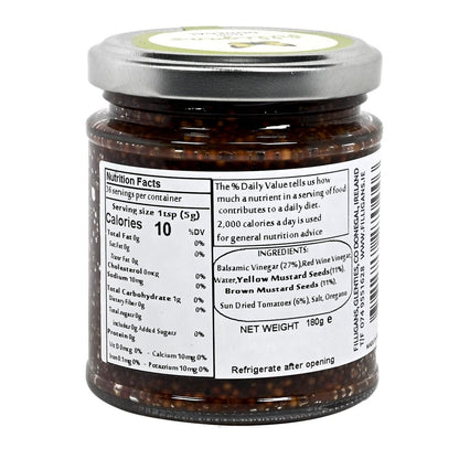 Back of a jar of Filligan's sundried tomato and balsamic mustard on a white background with label displaying nutrition and ingredients