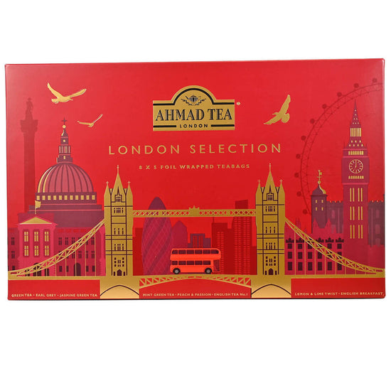 Red Box of Ahmad Tea London Selection tea bags with gold images of London landmarks including the London Bridge