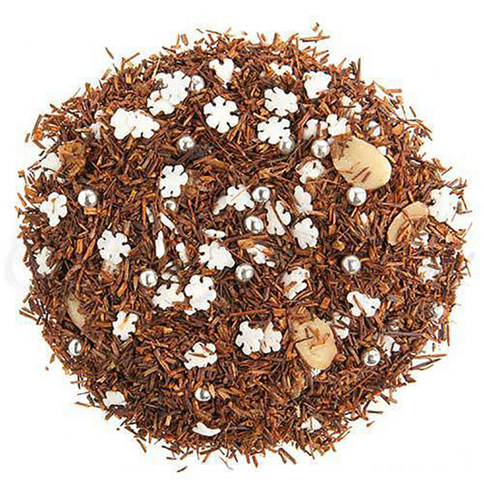 Tea blend with brown leaves, white flowers, and small beige and silver elements on a white background