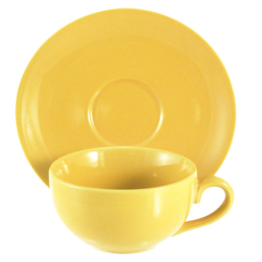 Yellow cup and saucer set on a white background