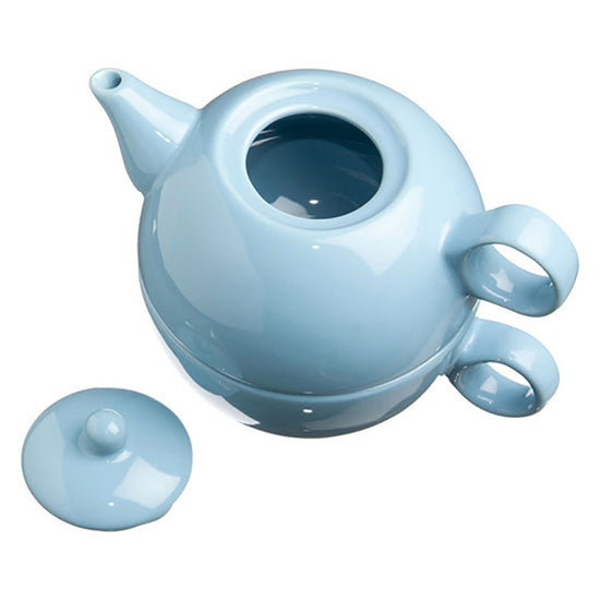 Light blue ceramic teapot with a matching lid on a white background