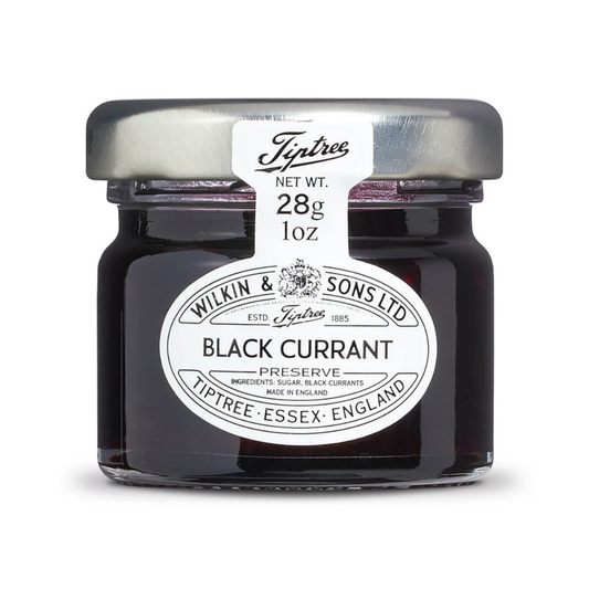 Jar of Tiptree Black Currant Preserve on a white background
