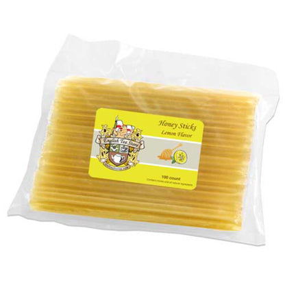 Pack of honey sticks with lemon flavor on a white background