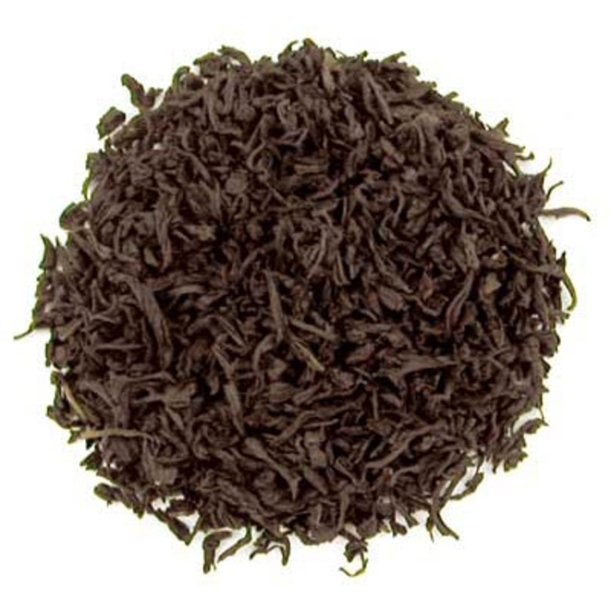 Dry loose leaf black tea on a white background