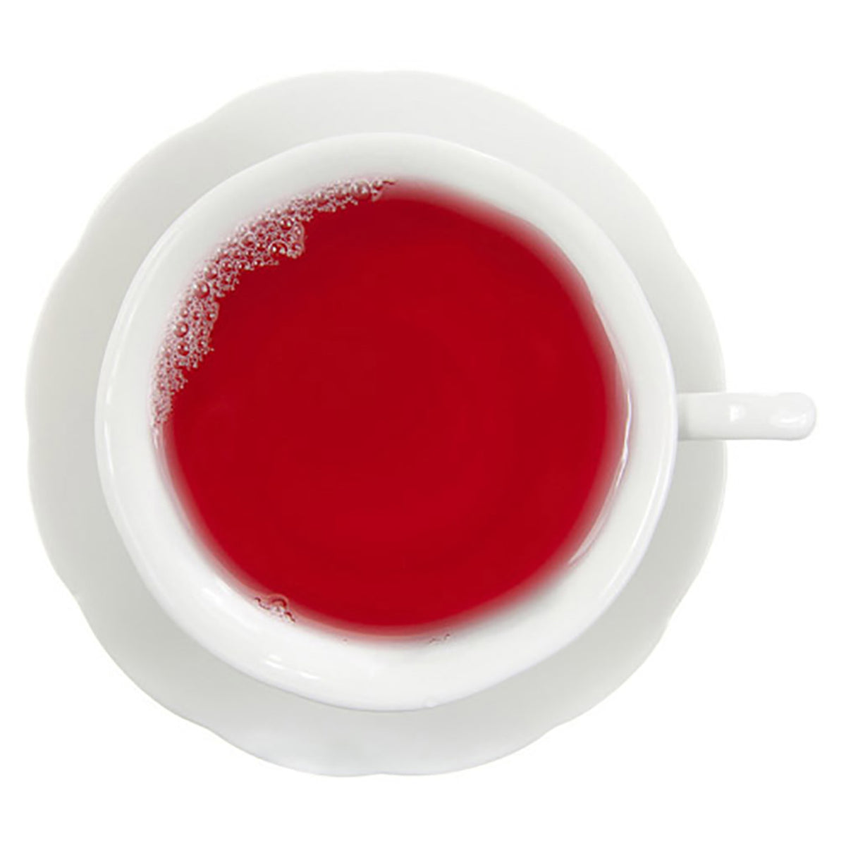 Top-down view of a white teacup on a white saucer on a white background filled with red colored hot tea